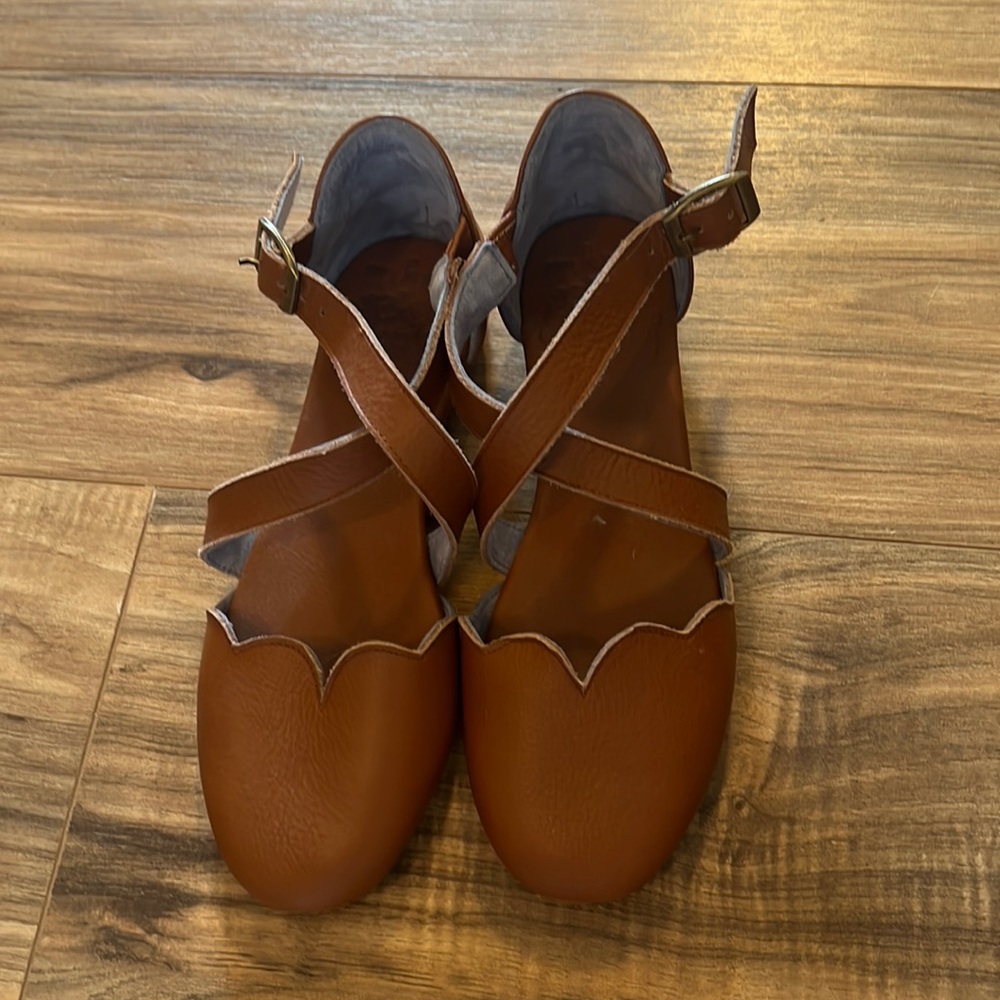 Brown Sandals with a small heel . Size 6